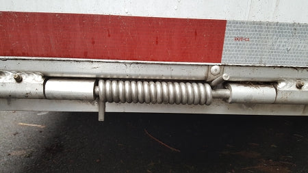 1/2" stainless steel spring Installed on a hinge-mounted ramp