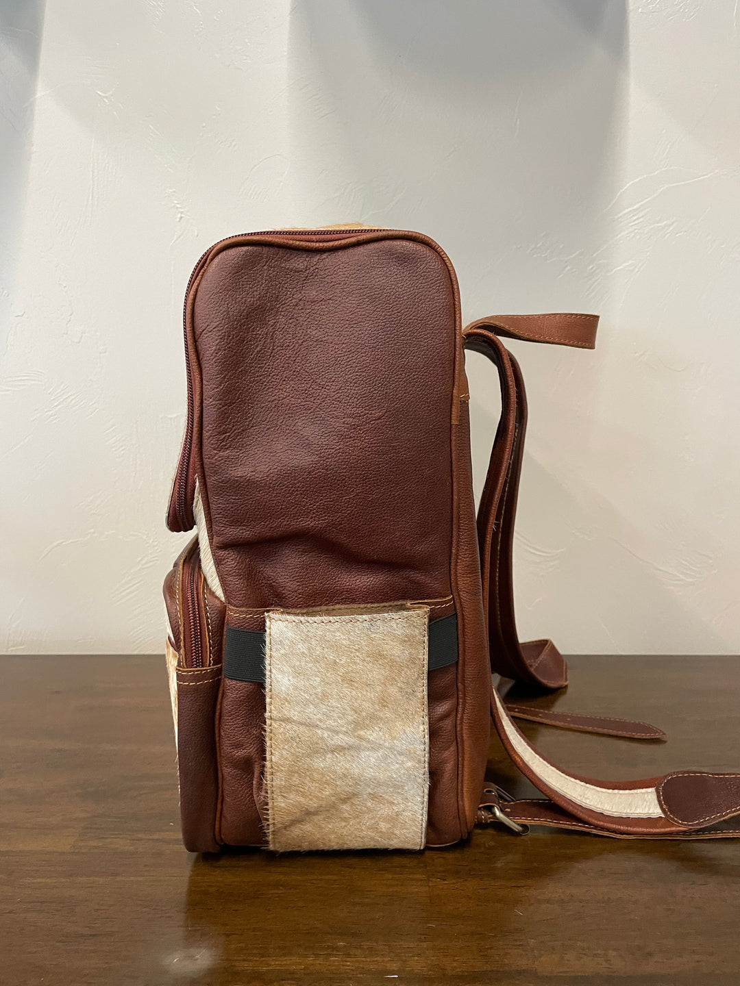 cowhide backpack brown and white