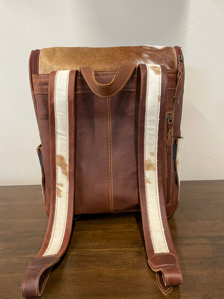 cowhide backpack brown and white