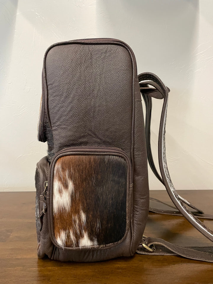 cowhide backpack dark brown