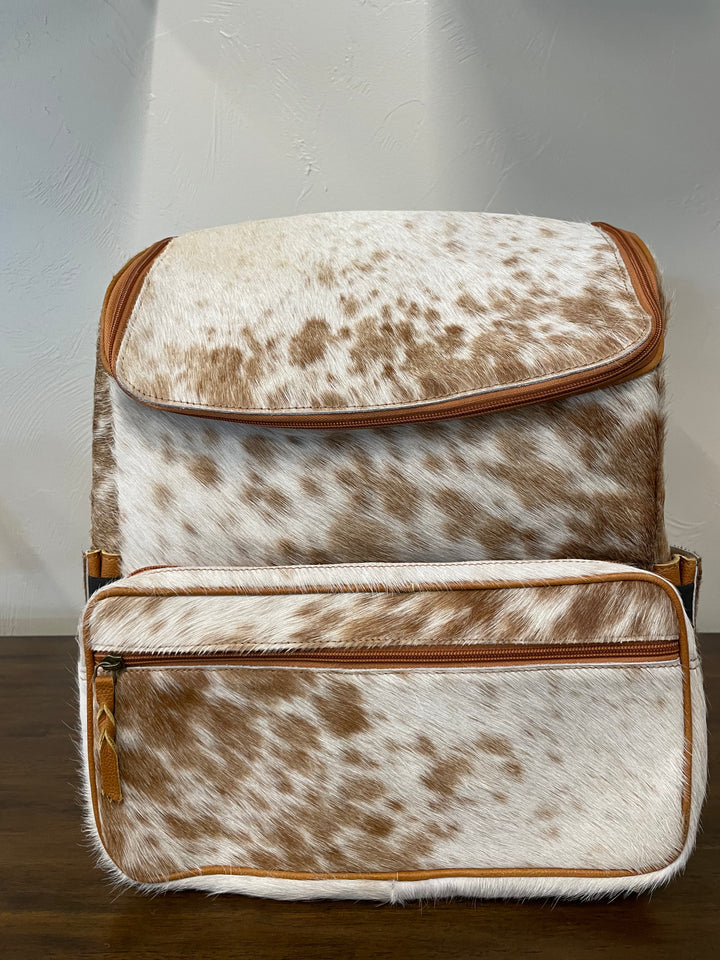 cowhide backpack tan and white