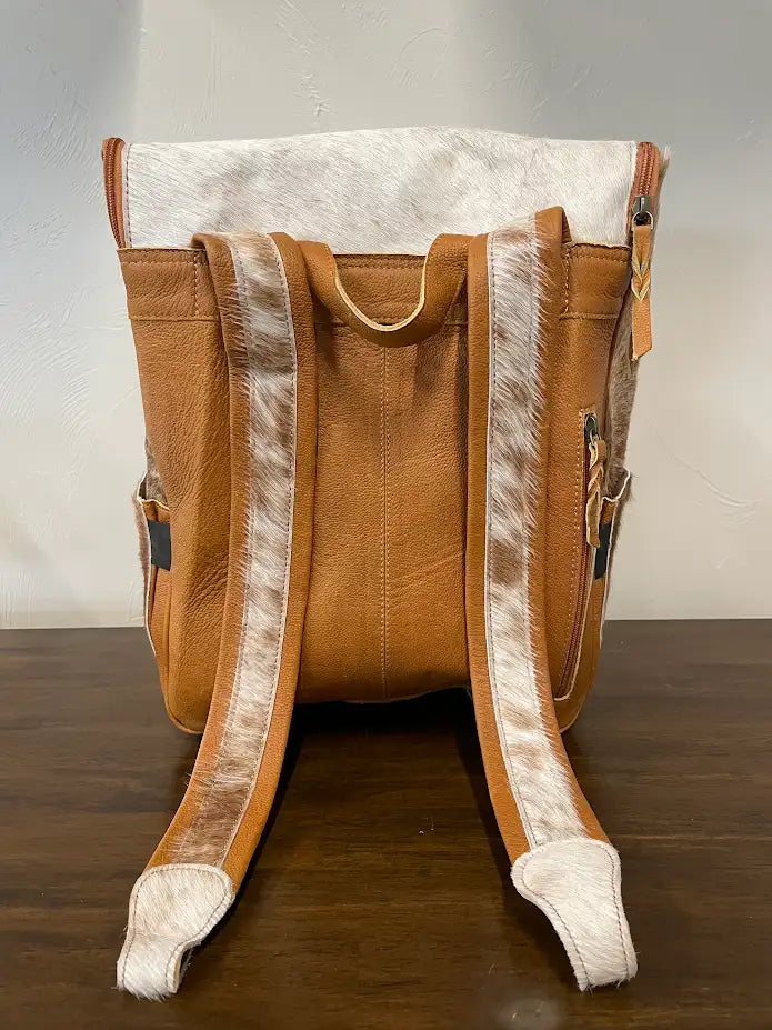 cowhide backpack tan and white