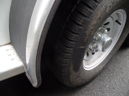 Fender trim is pliable enough to bend around the bottom curve of a fender.